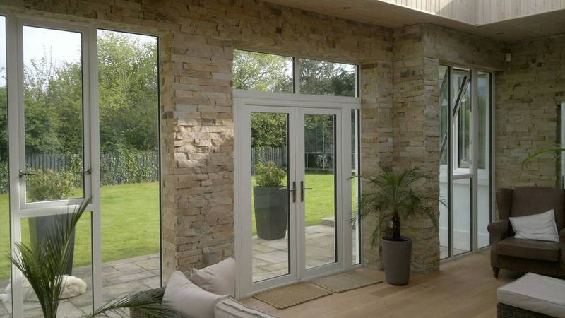 https://archerswindows.ie/wp-content/uploads/2019/06/French-Doors-In-White-Grain.jpg