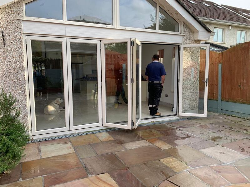 https://archerswindows.ie/wp-content/uploads/2019/12/Bi-Folding-Doors-1.jpg